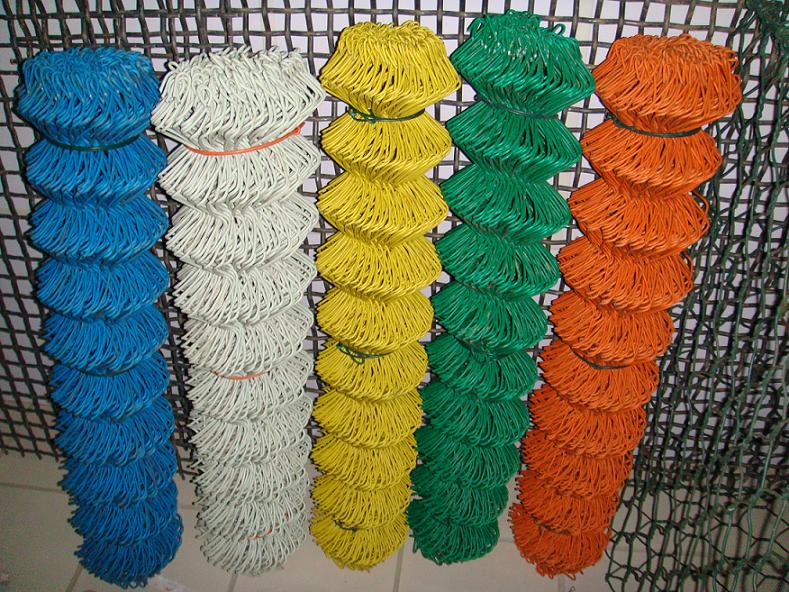 There are five shrink volumes of chain link fence in different colors.