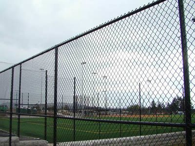 A black PVC coated football field fence with wrapping style is high.
