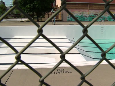 Chain link mesh functions as drowning protection fence.