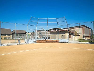 A galvanized chain link softball backstop fence with 16 ft. height for softball sport filed.